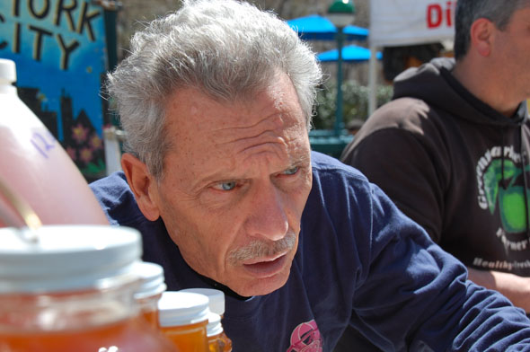 Norm Cote selling honey. Photo: Marie-Jose Daoud.