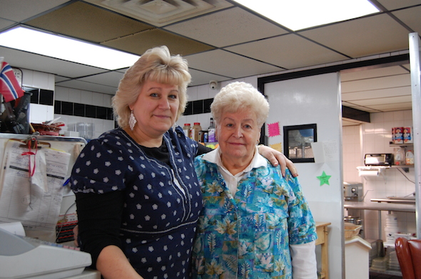  Arlene Rutuelo and her mother Helen Bakke stand behind the counter of Nordic Delicacies, the Scandinavian store they have managed since 1987. Photo: Marie-Jose Daoud.