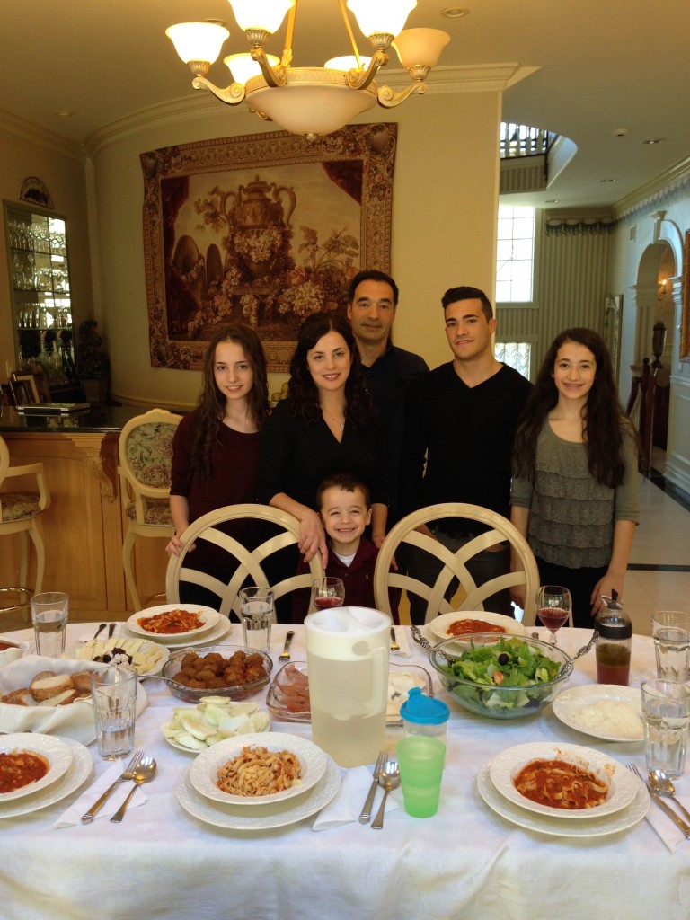 The Crispi family gathers around the Sunday supper. Photo: Jenna Dagenhart.