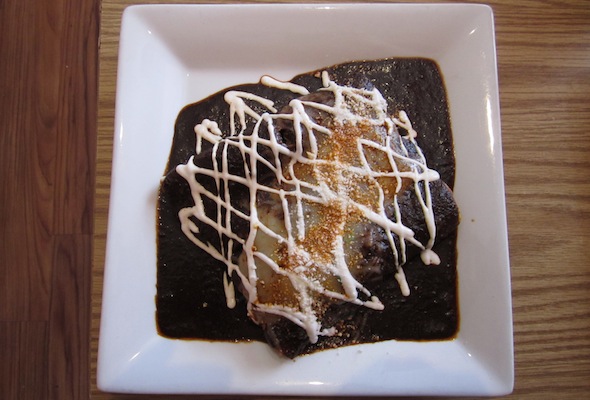 Enchilada with mole poblano. Photo: Clemence Michallon.
