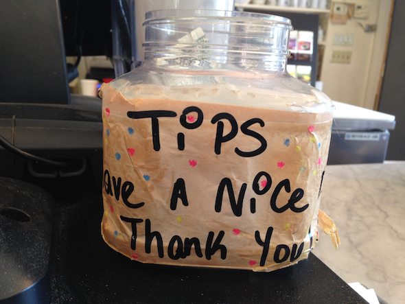 The tipped minimum wage does not apply to cashiers and baristas, but this jar shows how ingrained tipping has become in American culture.