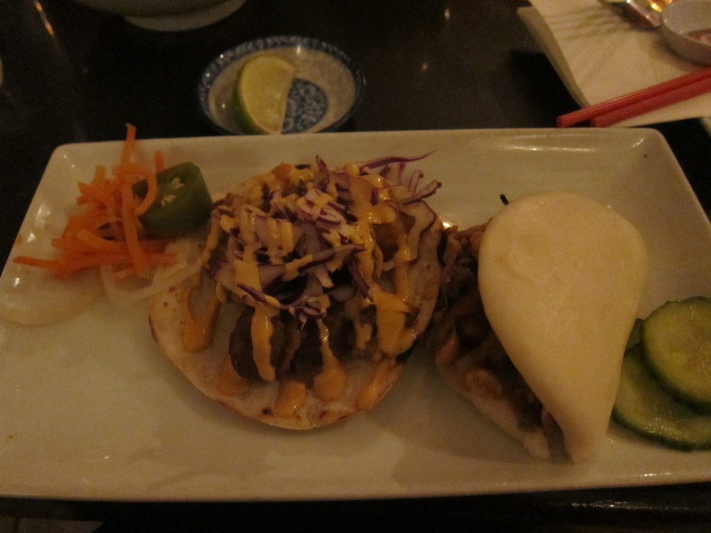 Pork belly taco and peking duck confit bao. Photo: Gema Flores.