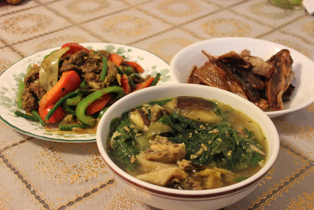  Three dishes of Cambodian food: Samlor Kako, Lap Khmer, and fish pickles. 