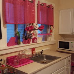 Epiphany's kitchen in her home on Staten Island. She surrounds herself with the color pink because she calls it her "happy color." Photo by Kailyn Lamb.