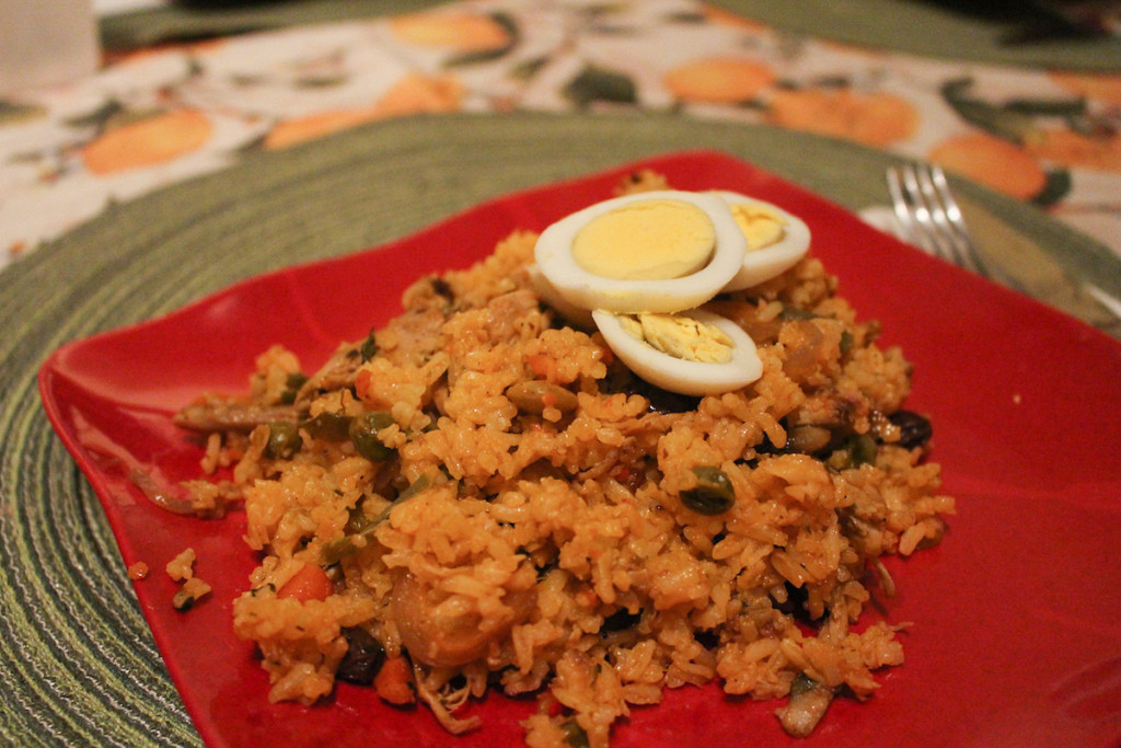 The finished dish for Sunday supper: arroz con pollo, with slices of hard-boiled egg. Photo: Roxanne Wang.