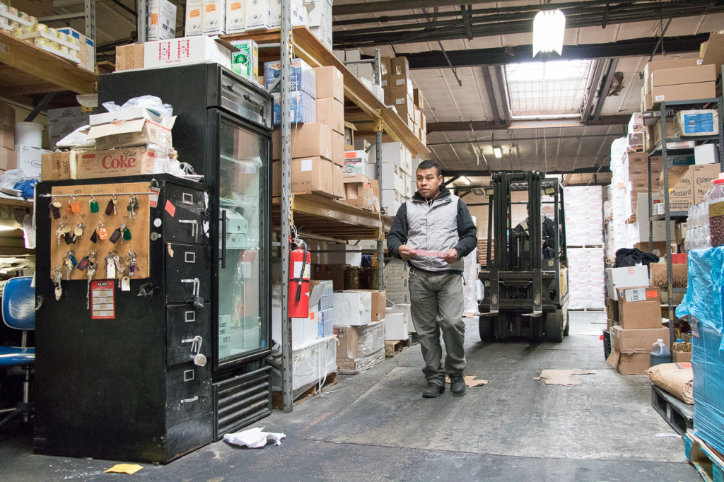 Juan Perez, a Mexican immigrant, works six days a week at a warehouse. Photo: Timmy Hung-Ming Shen.