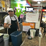Jorge Lopez, the owner of Taquerua y Fonda La Mexicana, works at night in his diner. Photo: Senhao Liu.