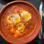 Shakshuka, a traditional Moroccan egg-dish, is one of Merzouka's most popular items. Photo: Emily Malcynsky.